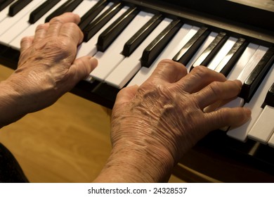 Hands Of Old Piano Player