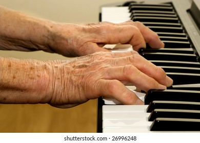 Hands Of Old Piano Player