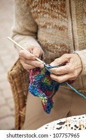 Hands Of Old Woman Knitting Wool, Close Up