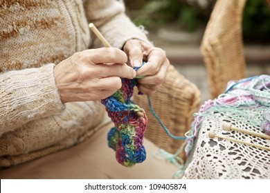 Hands Of Old Woman Knitting Wool, Close Up