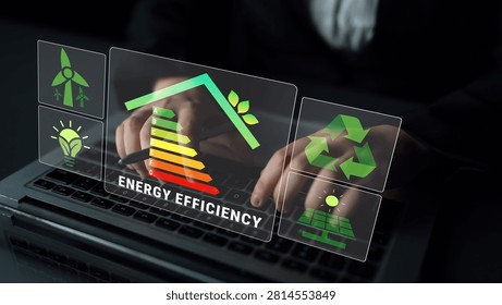Hands on Laptop with Transparent Interface Showing Energy Efficiency, Sustainable Practices, Renewable Energy Icons and Eco-Friendly Symbols in Modern Setting Quark.