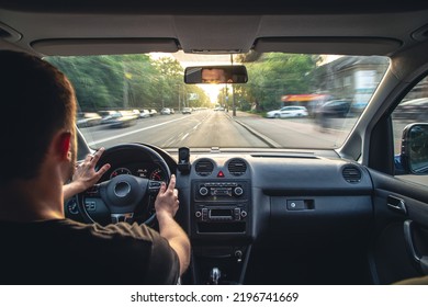 Hands on the wheel when driving at high speed from inside the car. - Powered by Shutterstock