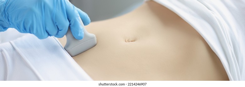 Hands On A Woman's Stomach, Ultrasound Abdominal Cavity