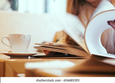 Hands Open Blank Catalog, Magazines,book Mock Up On Wood Table With Coffee