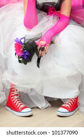 Hands Of Pank Bride Wearing In Pink Shoes And Gloves Hold Bouquet