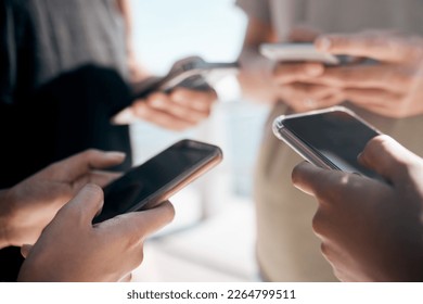 Hands, phone and people networking on social media, mobile app or chatting on mockup screen. Hand of group holding smartphone in circle for online network share, data sync or communication on display