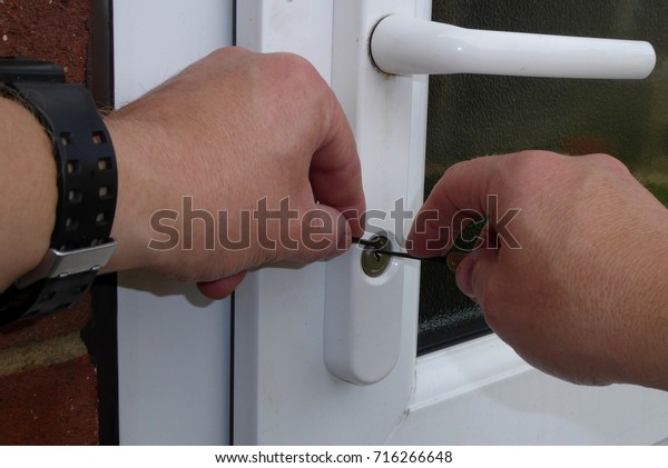 Hands Picking Door Lock Stock Photo Edit Now 716266648