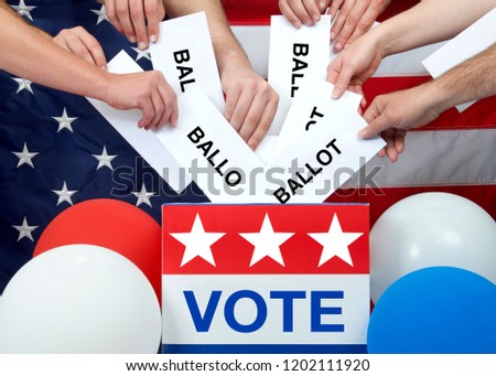 hands placing ballots in a voting box, American flag in background. Anyone over the age of 18 on election day and a citizen of the United States is eligible to vote. Voter turnout fluctuates in the US