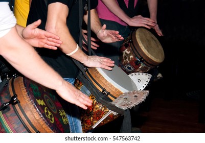 hands playing on the ethnic drums