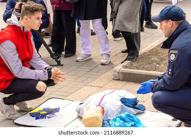 Hands Of A Policeman On A Mannequin During An Exercise Of Resuscitation. CPR First Aid Training Concept.Urgent Care.Vinnitsa. Ukraine. 04.05.2019. 