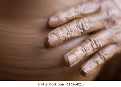  Hands Of Potter Do A Clay Pot