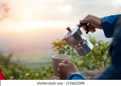 Hands Pouring Coffee From Mocha Pot, Coffee And Nature