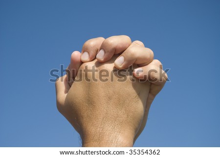 Similar – Men’s hands in the sunlight bruise the palms of their hands. High five close up.