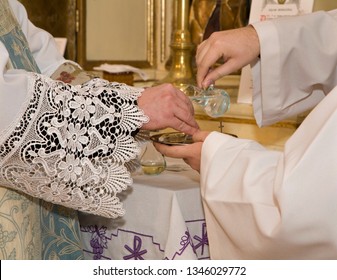 hands of priest by the mass - Shutterstock ID 1346029772