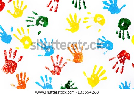 Hands prints made by children isolated on white background