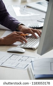 Hands Of Professional Civil Engineer Working On Computer In Office