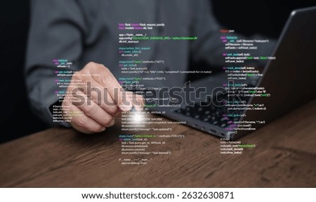 Hands of a programmer types on a laptop displaying programming code, symbolizing coding tech, software development, web applications. IT solutions, and digital technology