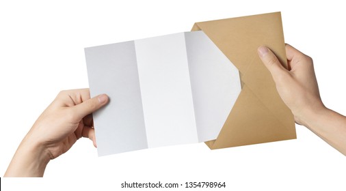 Hands pulling a blank folded paper out a brown envelope, isolated on white background