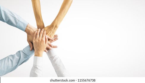 Hands Put Together On White Background With Copy Space. Union, Togetherness And Teamwork Concept 