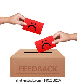 Hands Putting Bad Face Card Into Feedback Box. Service Rating, Satisfaction Concept. Clipping Path Included