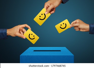 Hands Putting Smile Face Card Into Feedback Box. Service Rating, Satisfaction Concept