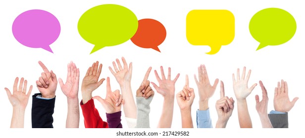 Hands raised up. Colorful speech bubbles. - Powered by Shutterstock