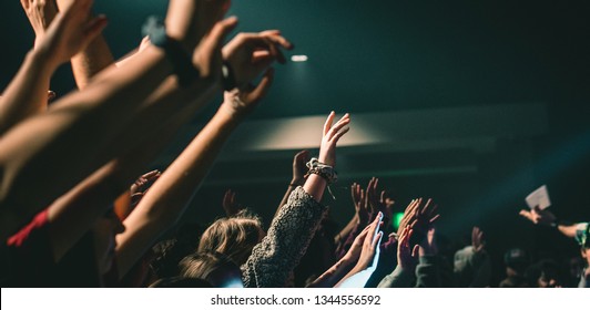 Hands Raised In Worship - Shutterstock ID 1344556592