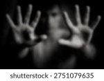 The Hands Reaching Forward in Dramatic Black and White Portrait with Blurred Face