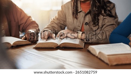 Hands, reading and group for Bible study, worship or people learning gospel for religion. Faith, Christianity and knowledge about God, scripture or theology text for guidance with spiritual growth
