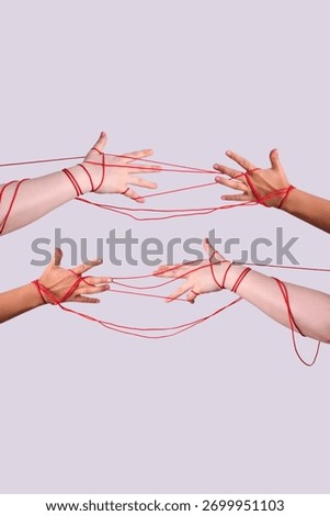 Hands with red string creating interconnected relationship concept
