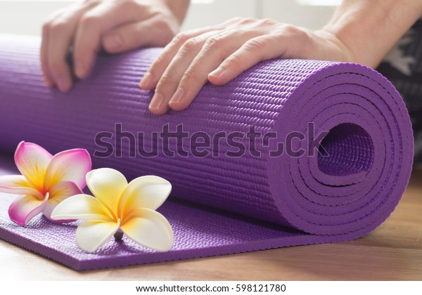 Hands Rolling Yoga Mat Stock Photo (Edit Now) 598121780