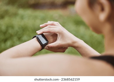 Hands, runner girl and check smart watch in park for steps, data or time app with results, fitness or nature. Woman, iot clock or monitor for speed, sport or reading for exercise, workout or health - Powered by Shutterstock