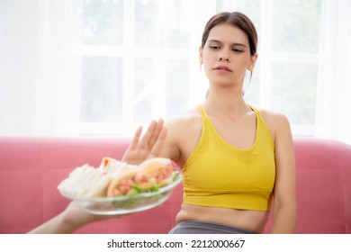 Hands Serving Food And Young Caucasian Woman Making Sign Say No Food Unhealthy With Obese, Woman Refuse And Push Out Food With Temptation For Dieting, Nutrition And Fast Food A Bad, Health Concepts.