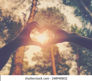 hands in shape of love heart - Shutterstock ID 248940832