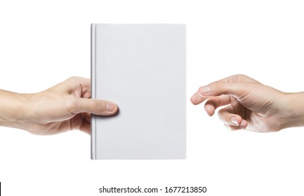 Hands sharing blank white hard cover book, isolated on white background
