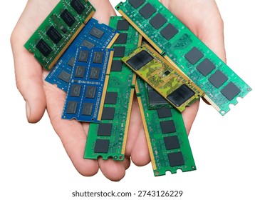 Hands show a mix of memory modules like DRAM and DDR. The current shortage of these components affects many industries.