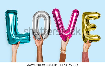 Hands showing love balloons word