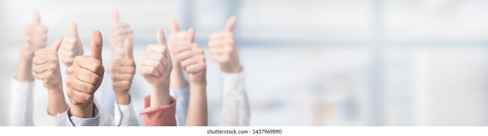 Hands showing the thumb and the symbol ok. Concept of winning people, winners. - Shutterstock ID 1437969890