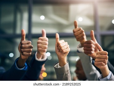Hands showing thumbs up with business men endorsing, giving approval or saying thank you as a team in the office. Closeup of corporate professionals hand gesturing in the positive or affirmative - Shutterstock ID 2189252025