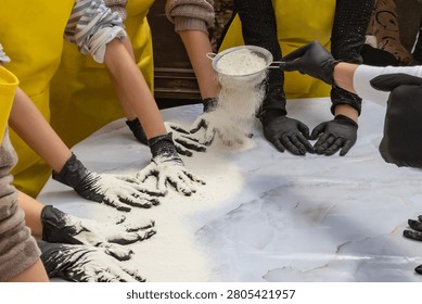 Hands Sifting Flour During Interactive Baking Workshop and Homemade Bread Making Class