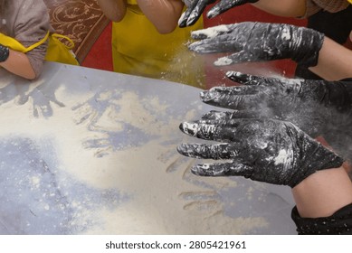Hands Sifting Flour During Interactive Baking Workshop and Homemade Bread Making Class