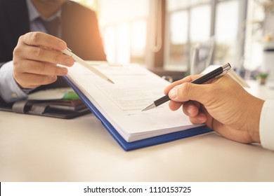Hands are signing contract agreement.Contract agreement policy concept. - Shutterstock ID 1110153725