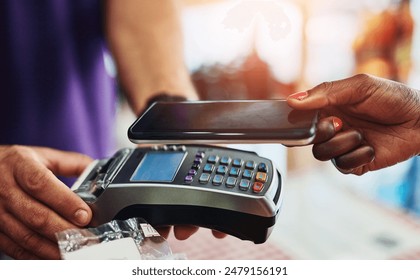 Hands, smartphone and card machine for payment at counter, shopping and transaction at florist. People, purchase and technology in shop for retail, checkout and POS in small business in Spain - Powered by Shutterstock