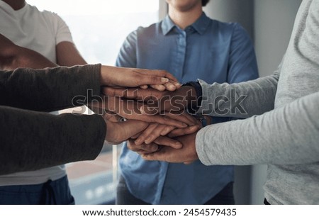 Hands stack, team work and people with support, collaboration and love or care and solidarity in therapy. Group standing together with unity, compassion and helping for psychology and mental health