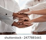 Hands, stack and teamwork for people in office with collaboration, support and connection. Group, scrum or huddle with solidarity, synergy and motivation for mission with link in workplace at startup