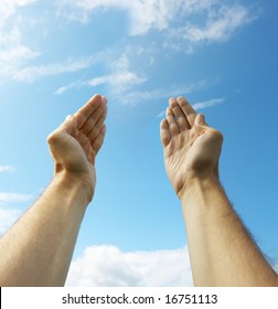 Hands stretched to the sky