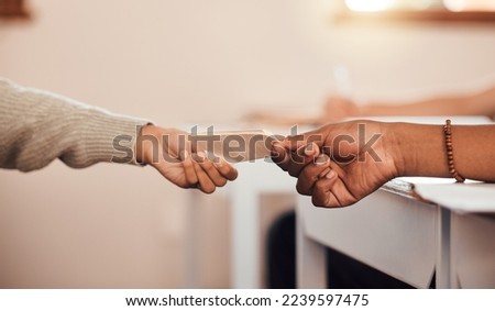 Hands, students pass note in classroom, communication and secret at school with message on paper. Education, learning and people in class for lesson, scholarship and academic with letter writing.