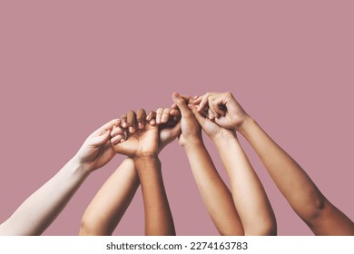 Hands, support and people in unity, togetherness and solidarity on pink studio background. Women outreach, hand and friends group and team, teamwork or diversity, collaboration and trust isolated