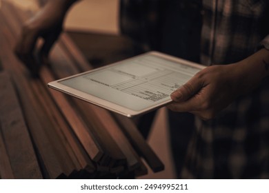 Hands, tablet and screen for inventory in workplace for sales, database and stock management with ux. Woman, tech and app in foundry for communication, business website and project spreadsheet tools - Powered by Shutterstock