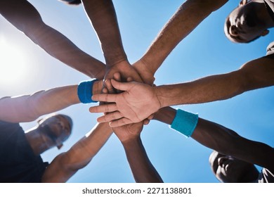 Hands, teamwork and unity for motivation below in sports collaboration, strategy or game cooperation outside. Hand of group piling for team coordination, agreement or partnership in sport meeting - Powered by Shutterstock
